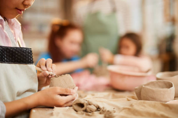 istock Little Girl Shaping Clay 1135415982