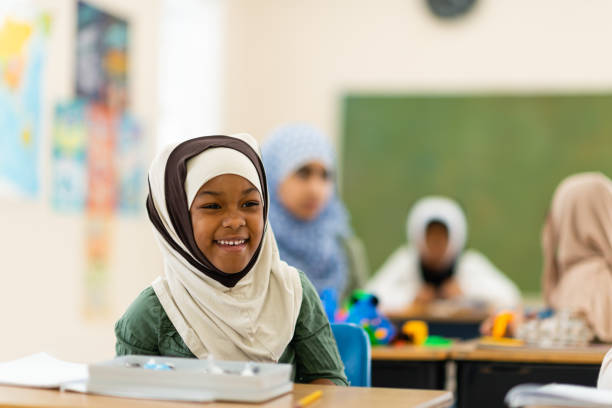 istock Muslim girl laughing 1135420275