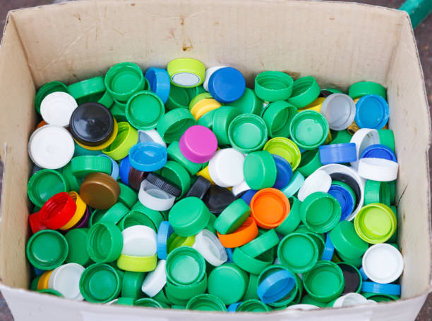 istock Bottle Cap, made of Polypropylene and Polyethylene Plastic Resin, do not biodegrade. If not recycled, these caps pose danger to marine life because of small size. Environmental Protection Care concept 1135422207
