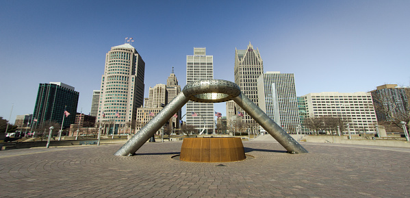 Detroit, Michigan, USA - March 18, 2018: Downtown Detroit Michigan cityscape with skyscrapers and the landmark Hart Plaza fountain. Detroit is the largest city in the state of Michigan.