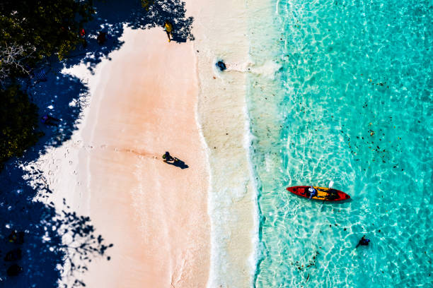 istock tourists paddle kayak in Boulder Island, Myanmar 1135430220