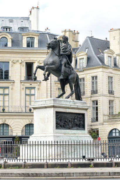 istock Louis XIV Statue - Paris, France 1135435358