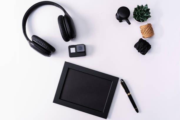 istock Mockup, Photo Frame, Action camera, Headphones, Pen, and Cactus, Black object on white background 1135438610