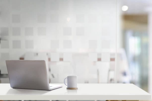 istock Mock up laptop on office desk 1135441348