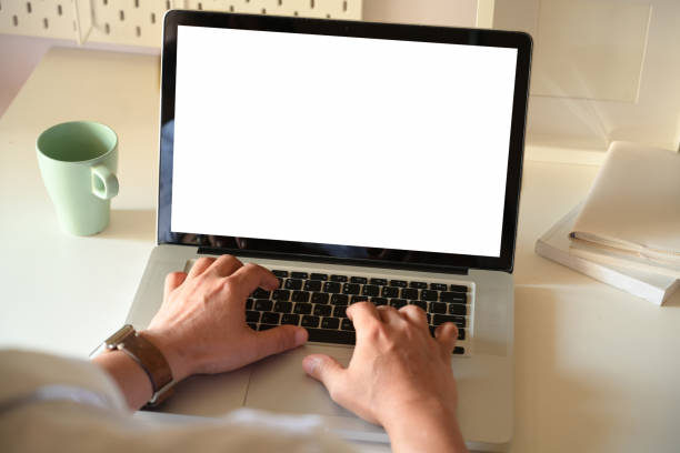 istock side view man working with laptop is on the work table in a conner office 1135441454