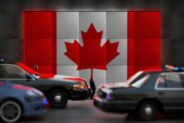 Calgary, Alberta, Canada. Jul 10, 2024. A Calgary Police officer stopping a car on the road to check for valid driver's licenses.