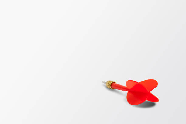 istock Close up red dart isolated on gray background. 1135447395