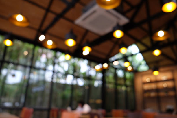 istock Blur coffee shop - cafe blurred with bokeh background, vintage style 1135448526
