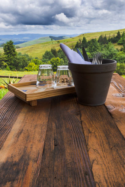 istock Table settings with glasses, napkins and cutlery on a wooden table. 1135459590