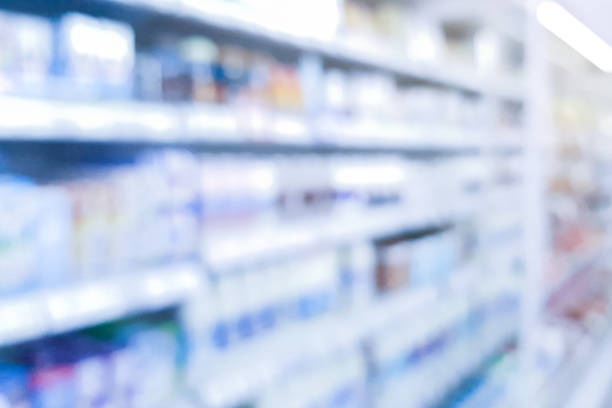 абстрактные размытые аптеки прохода по�лка распределения фона для медицинской фармацевтической бизнес-концепции - фармацевтической стоковые фото и изображения