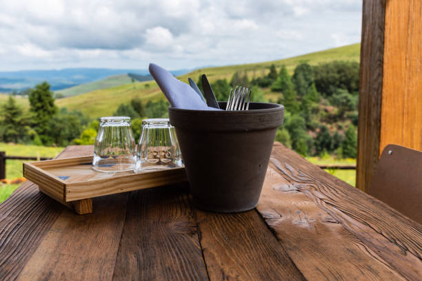 istock Table settings with glasses, napkins and cutlery on a wooden table. 1135461174