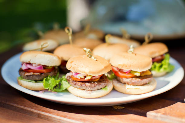 istock mini burgers at catering event 1135470033