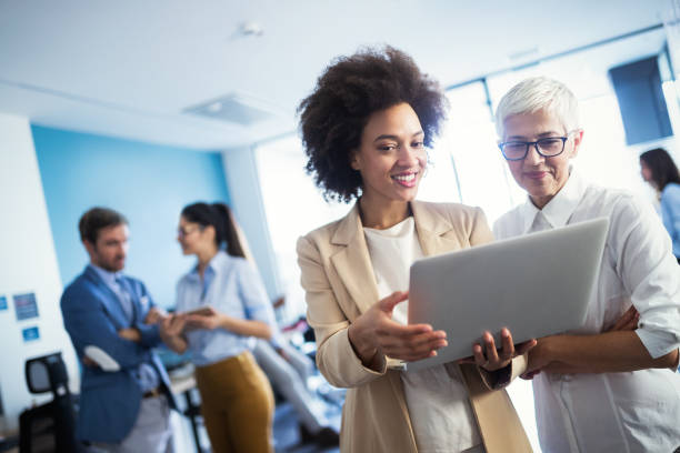 istock Successful business group of people at work in office 1135470215