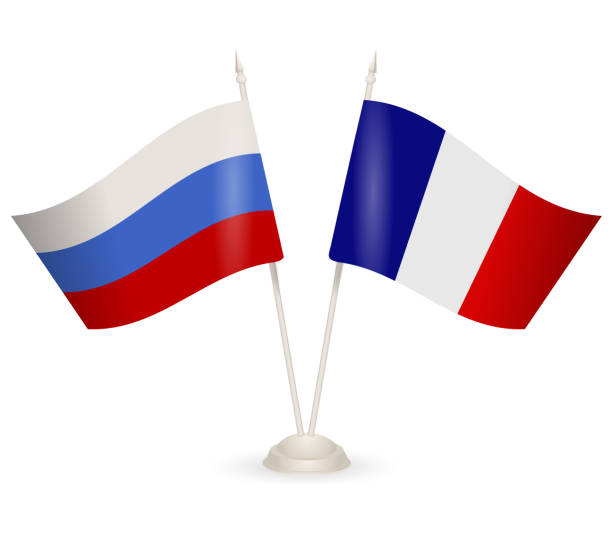 istock Table stand with flags of Russia and France. 1135470472