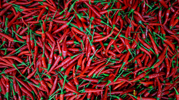 istock Red Chillies Background at market 1135470596