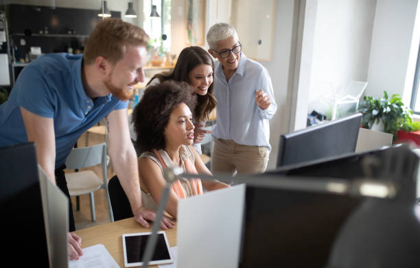 istock Successful group of business people at work in office 1135471552