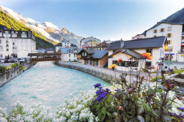 Traveling to high French Alps in summer The village of Chamonix, France. View over the river Arve chamonix photos stock pictures, royalty-free photos & images