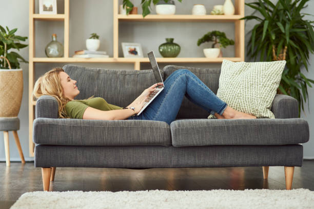 istock Lounging around with the laptop 1135474766
