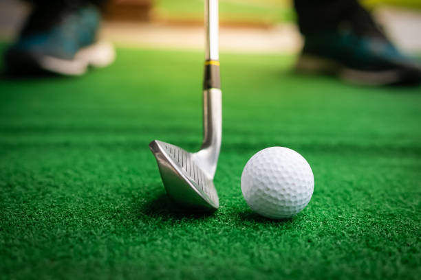 istock Golf club and ball in green grass. 1135477824