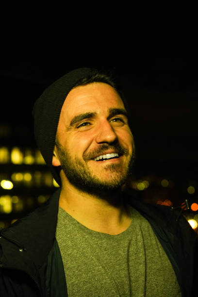 istock Casual man in the city at night 1135479302