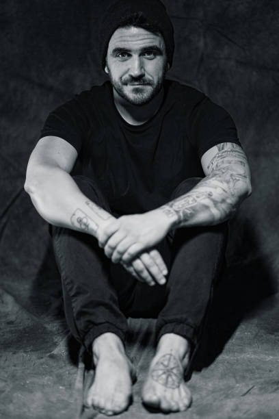 istock Casual man with tattooed arm 1135479483