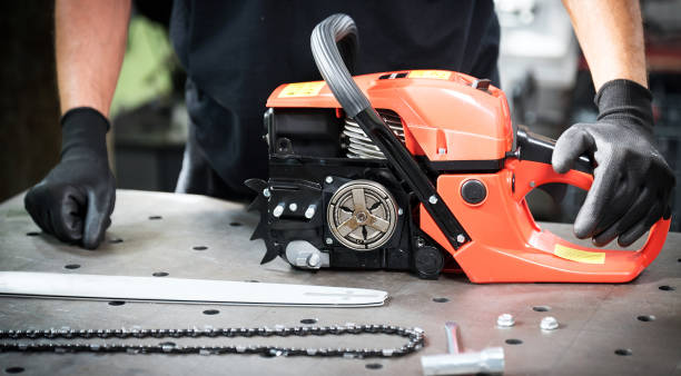 istock Work in the workshop, changing the chain in the chainsaw 1135479897