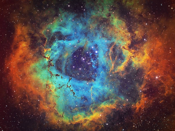The Rosette Nebula (NGC 2237, Caldwell 49) in the constellation of Monoceros, HST image The Rosette Nebula (NGC 2237, Caldwell 49) is the large hydrogen, sulfur and oxygen gas cloud in the constellation of Monoceros. The open star cluster NGC 2244 (Caldwell 50) consists of stars being formed from the nebula. The nebula is 5,200 light years away from Earth. Amateur image, total exposure time: 15h45m, HST palette image. molecule photos stock pictures, royalty-free photos & images