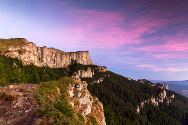 istock Mountains landscape with vibrant colorful sky 1135485164