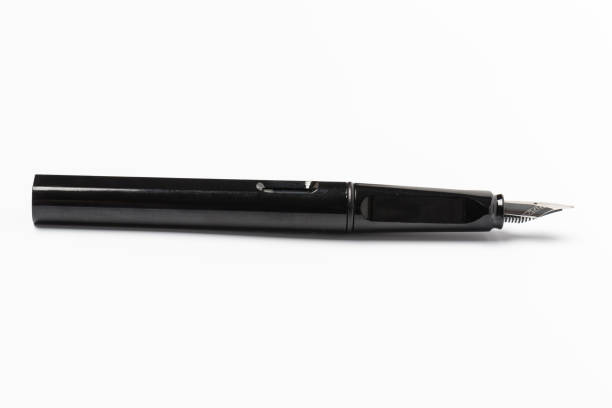 istock Black fountain pen isolated on white background 1135485509