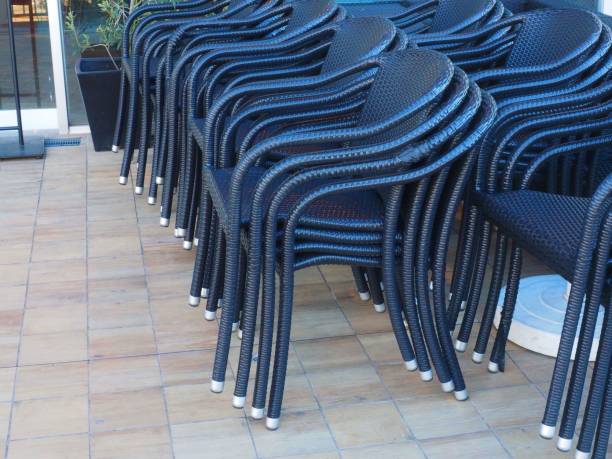 istock outdoor black stacking chair 1135485882