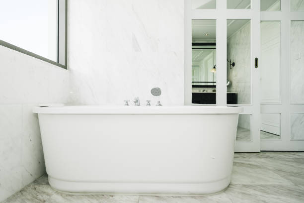 istock Beautiful luxury white bathtub decoration in bathroom interior 1135487927