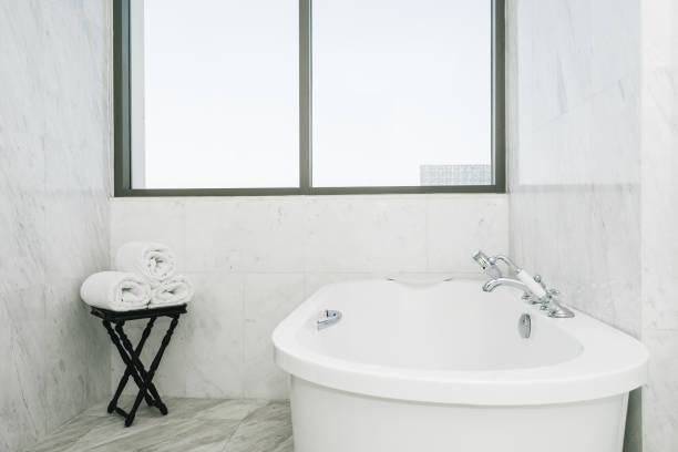 istock Beautiful luxury white bathtub decoration in bathroom interior 1135488134