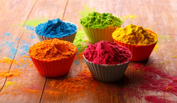 Holi color powder. Organic Gulal colours in bowl for Holi festival, Hindu tradition festive Holi color powder. Organic Gulal colours in bowl for Holi festival, Hindu tradition festive. dye stock pictures, royalty-free photos & images