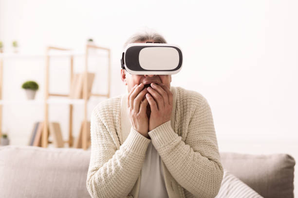 Mature man in google glasses travel on virtual world