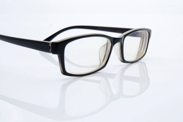 istock Close-Up Of Eyeglasses On Gray Background 1135497217