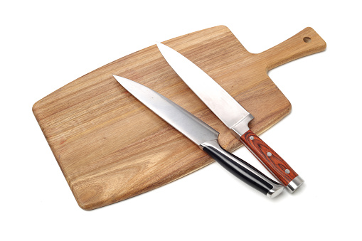 Kitchen wooden board with knife on white background
