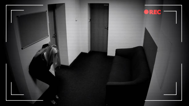 istock Woman losing consciousness in office corridor, poisoning, CCTV camera effect 1135499853