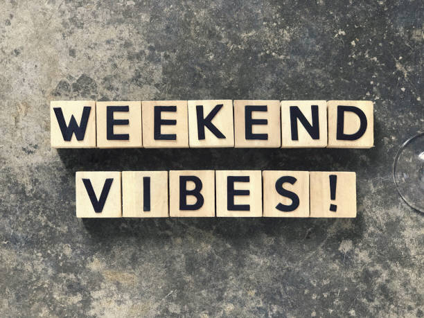 Motivational and inspirational wording. WEEKEND VIBES written on wooden blocks. saturday stock pictures, royalty-free photos & images