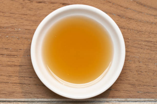 istock Fish sauce on a cup on wood 1135500116