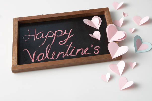 istock Pink Paper Heart with Blackboard Valentine's day concept 1135502917