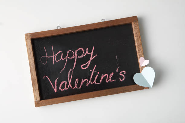 istock Pink Paper Heart with Blackboard Valentine's day concept 1135503555