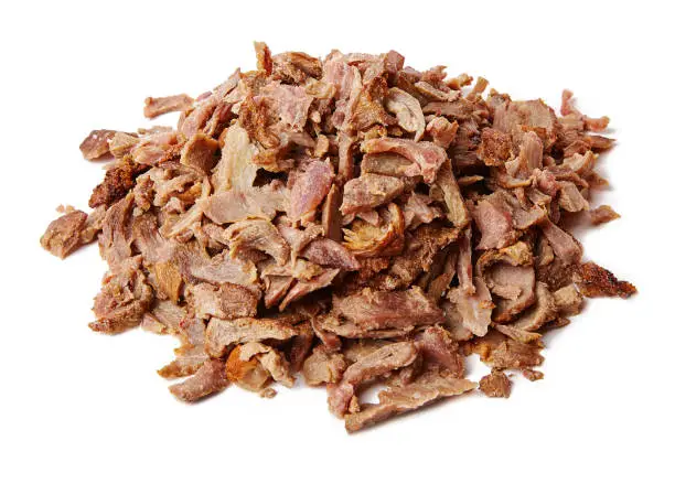 Doner kebab. Grilled beef meat. Minced pieces. Isolated on a white background