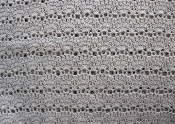 istock Knitwear Fabric Texture. Handmade  Beige Knitted Background 1135506260