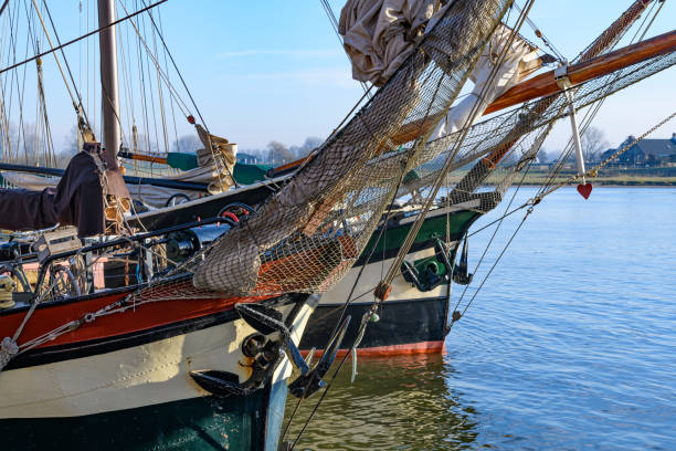 istock Ship moored in Kampen at the river IJssel during sunrise 1135508899