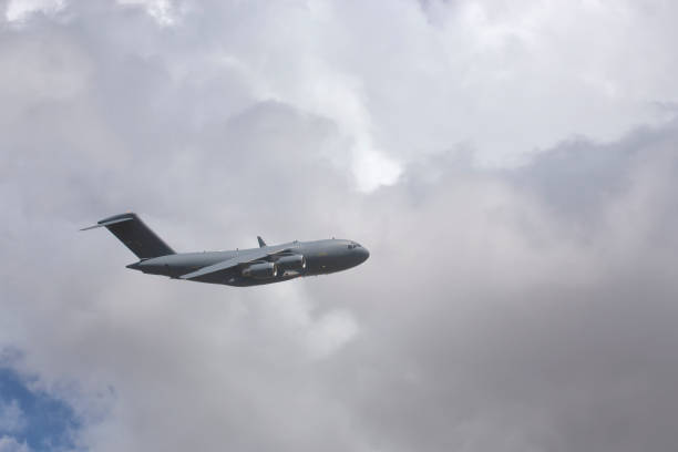 istock Military plane and cloudscape in Tropical North Queensland, Australia 1135511468