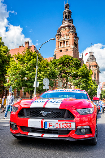 Szczecin, Poland - June 30, 2018: A Ford GT from 2017 parked on a street in the Szczecin city center. At this public Mustang car lovers' gathering people walk in the background admiring the many Mustang cars.