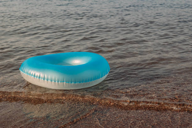 istock Blue inflatable circle for swimming at sea 1135514053
