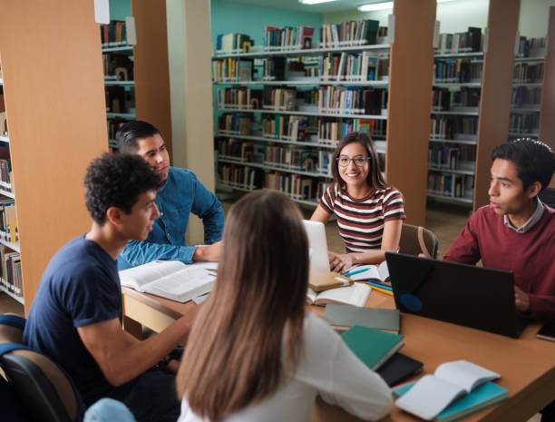 istock Group of latin college students studying 1135517344