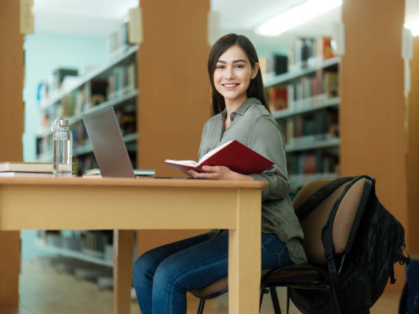 istock Beautiful latin college student 1135517364