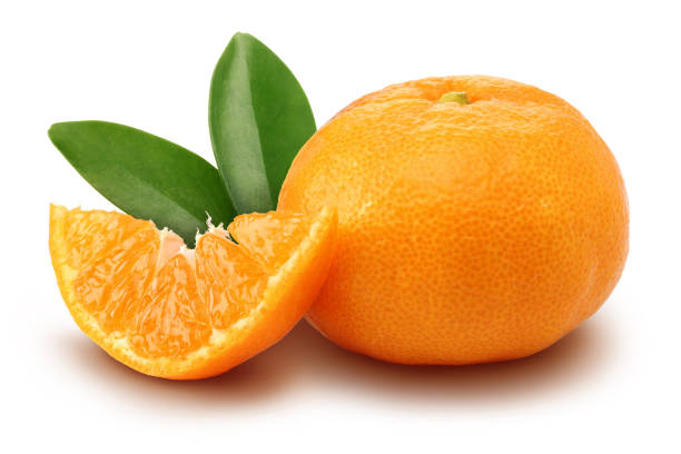 istock Fresh mandarin with slice and leaves isolated 1135517664